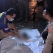 Polisi saat merespon laporan warga yang menemukan sosok mayat bayi di tempat sampah.Foto: Humas Polresta Jayapura Kota.