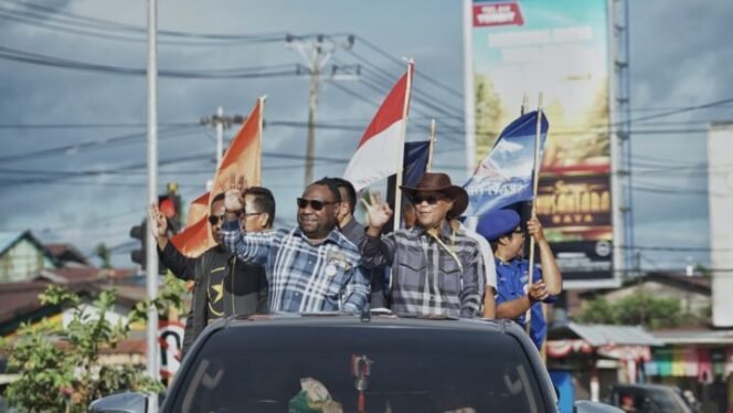 
Alexander Omaleng & Yusuf Rombe ketika mengikuti Pawai Deklarasi Damai.(Foto: MEDIA/AIYE)