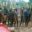 Perlawanan ekologis dan spiritual masyarakat adat Suku Awyu di Papua memajang salib merah—yang tampaknya memiliki makna religius dan perlawanan kultural - (foto: Dok Walhi Papua)