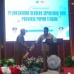 PJ Sekda Papua Tengah, Silwanus Sumule saat membuka kegiatan seminar Sekolah Sepanjang Hari, Senin (20/7/2026). Foto: Kristin Rejang/Sasagupapua.